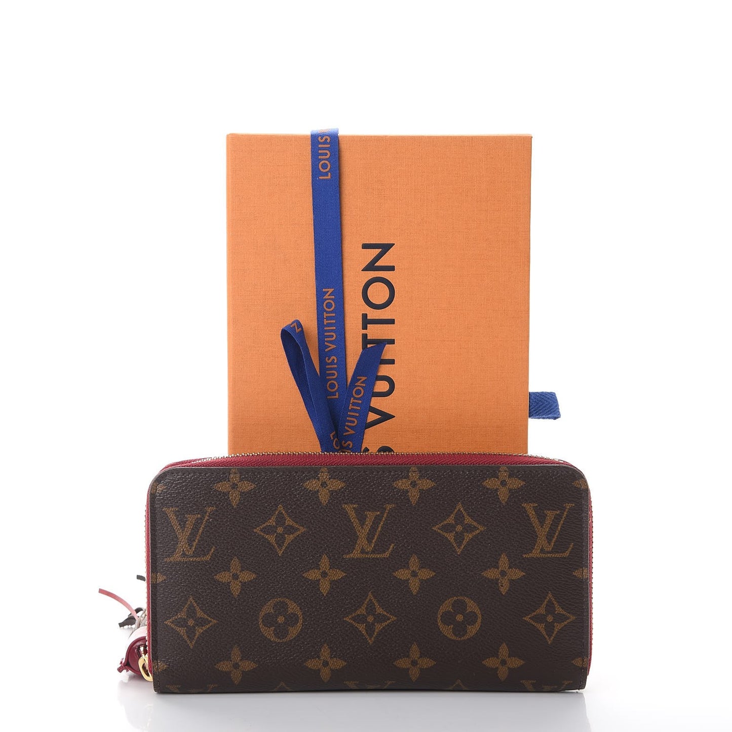 Monogram Pompon Zippy Wallet Fuchsia