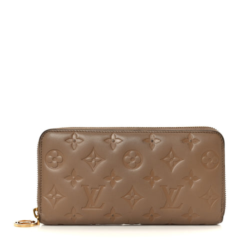Lambskin Embossed Monogram Coussin Zippy Wallet Taupe