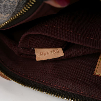 Louis Vuitton Monogram Rivoli MM 7 of 10