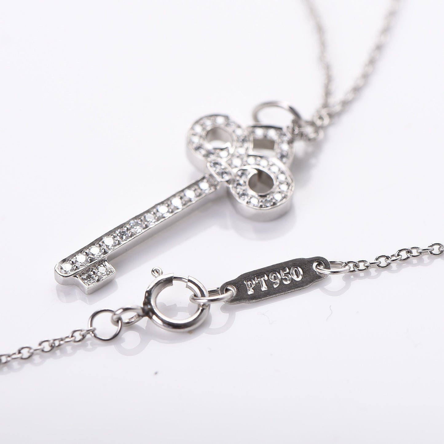 Platinum Diamond .12ct Fleur De Lis Key Pendant Necklace