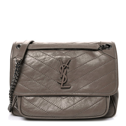 Saint Laurent Crinkled Calfskin Matelasse Monogram Medium Niki Chain Satchel Greyish Brown 1 of 10