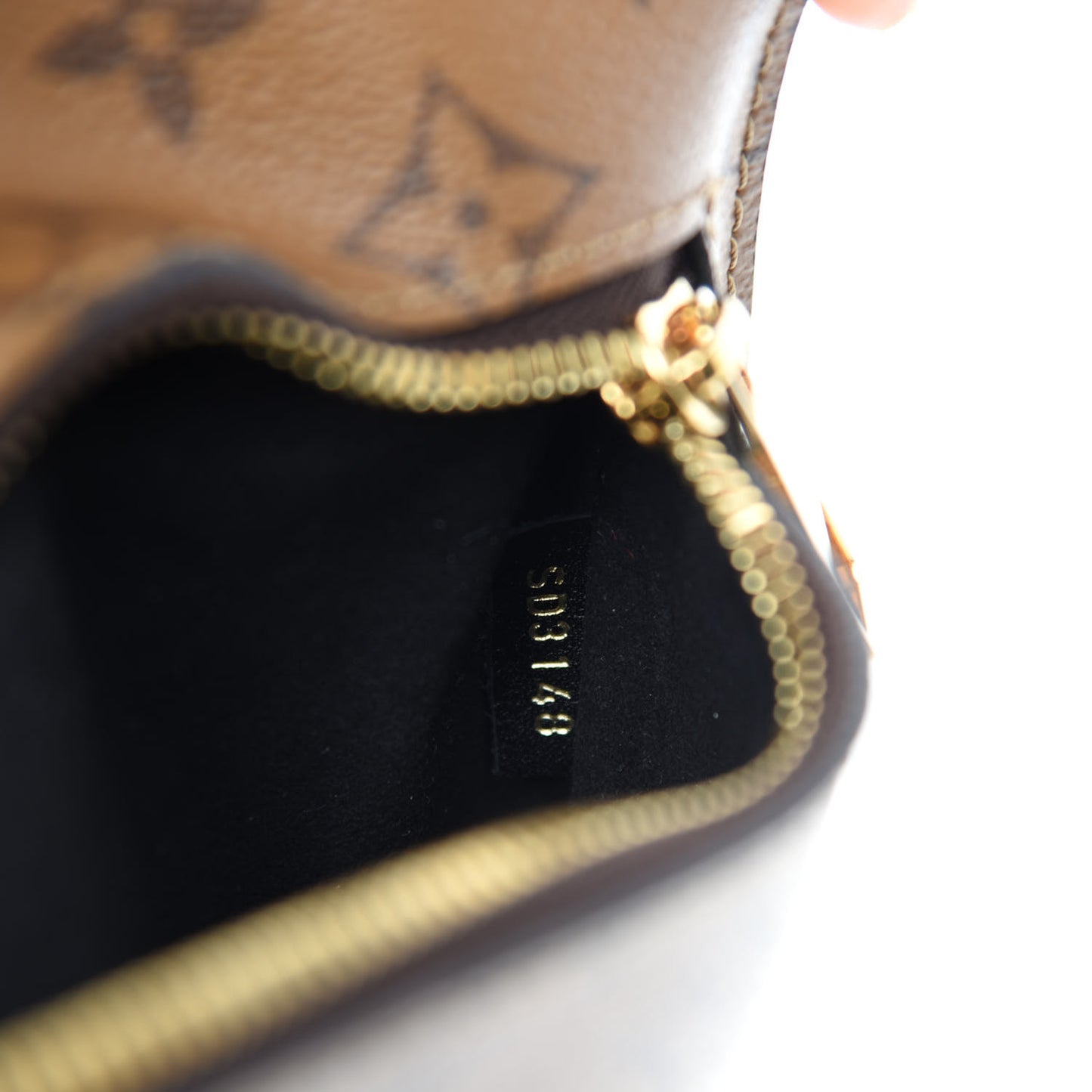 Reverse Monogram Pochette Metis