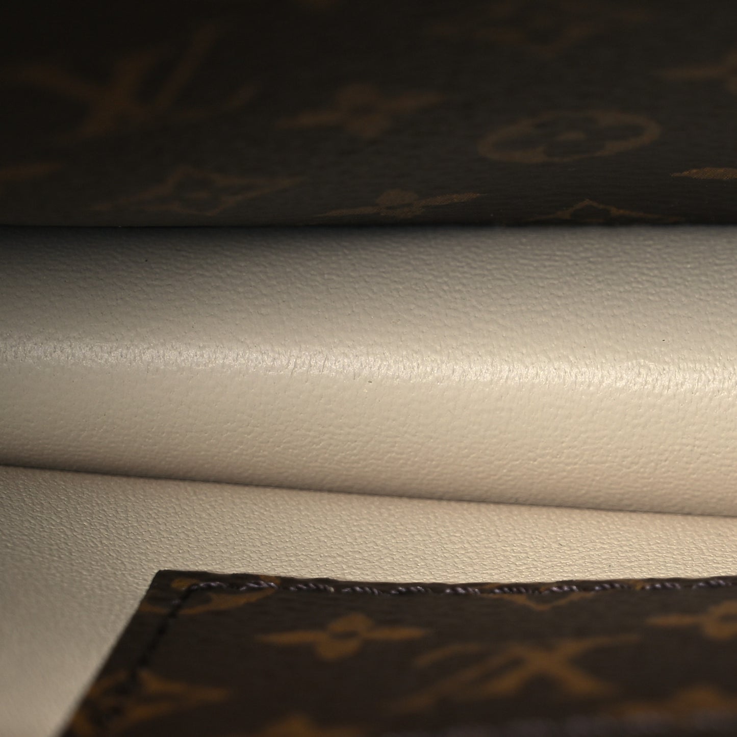 Reverse Monogram Trunk Clutch