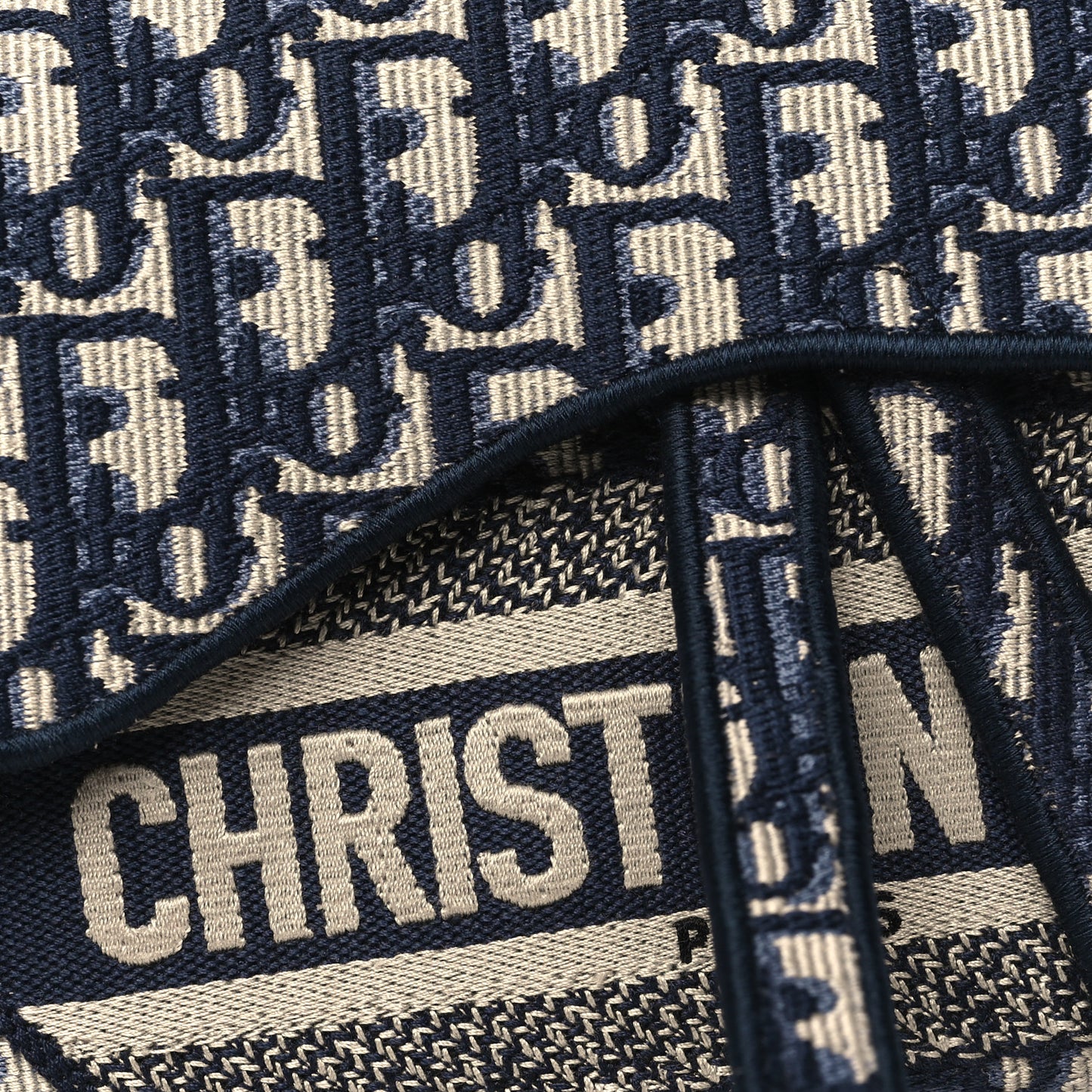 Oblique Embroidered Saddle Bag Blue