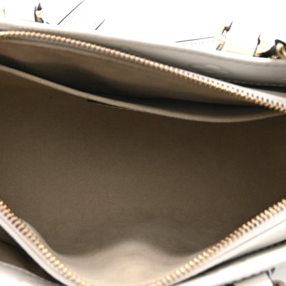 Louis Vuitton Calfskin Embossed Monogram OnTheGo East West White 5 of 10