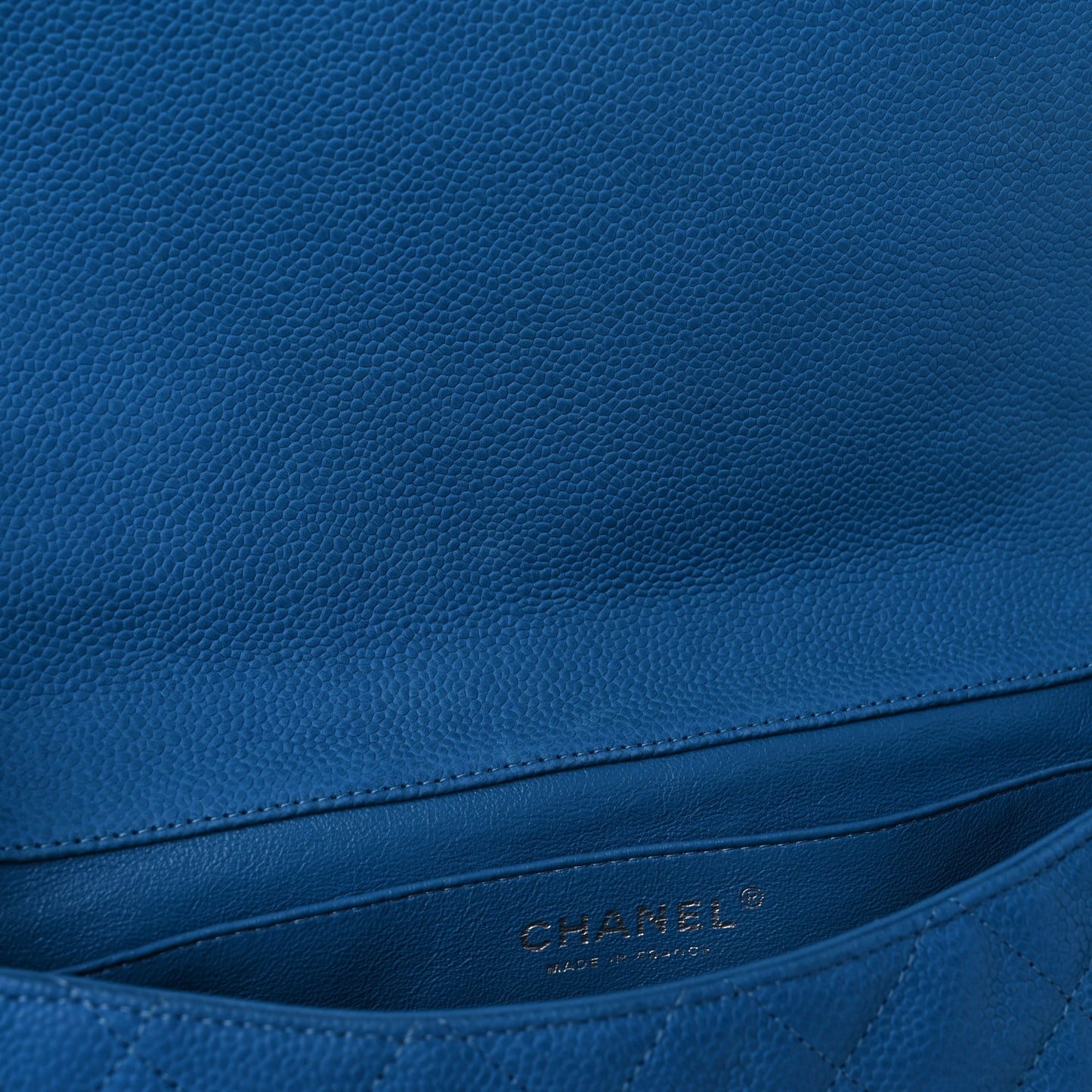 Iridescent Caviar Quilted Clutch With Chain Flap Blue