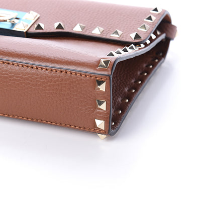 Valentino Garavani Pebbled Calfskin Medium Rockstud Flip Lock Crossbody Bag Bright Cognac 8 of 8