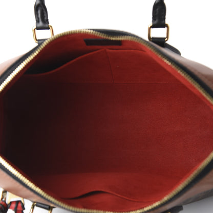 Louis Vuitton Monogram Tuileries Caramel Rouge 4 of 9