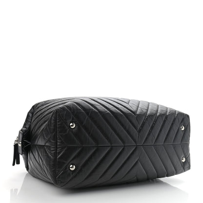 Chanel Aged Calfskin Chevron Quilted Duffle Bag Black 4 of 15