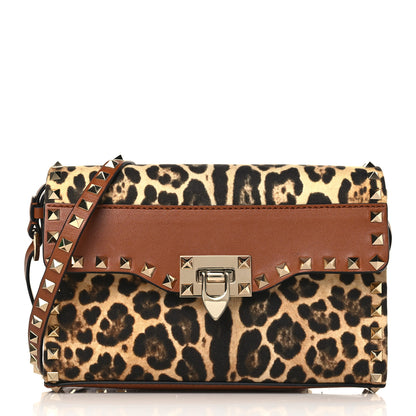 Valentino Garavani Calfskin Canvas Leopard Print Medium Rockstud Flip Lock Crossbody Bag Tan 1 of 9
