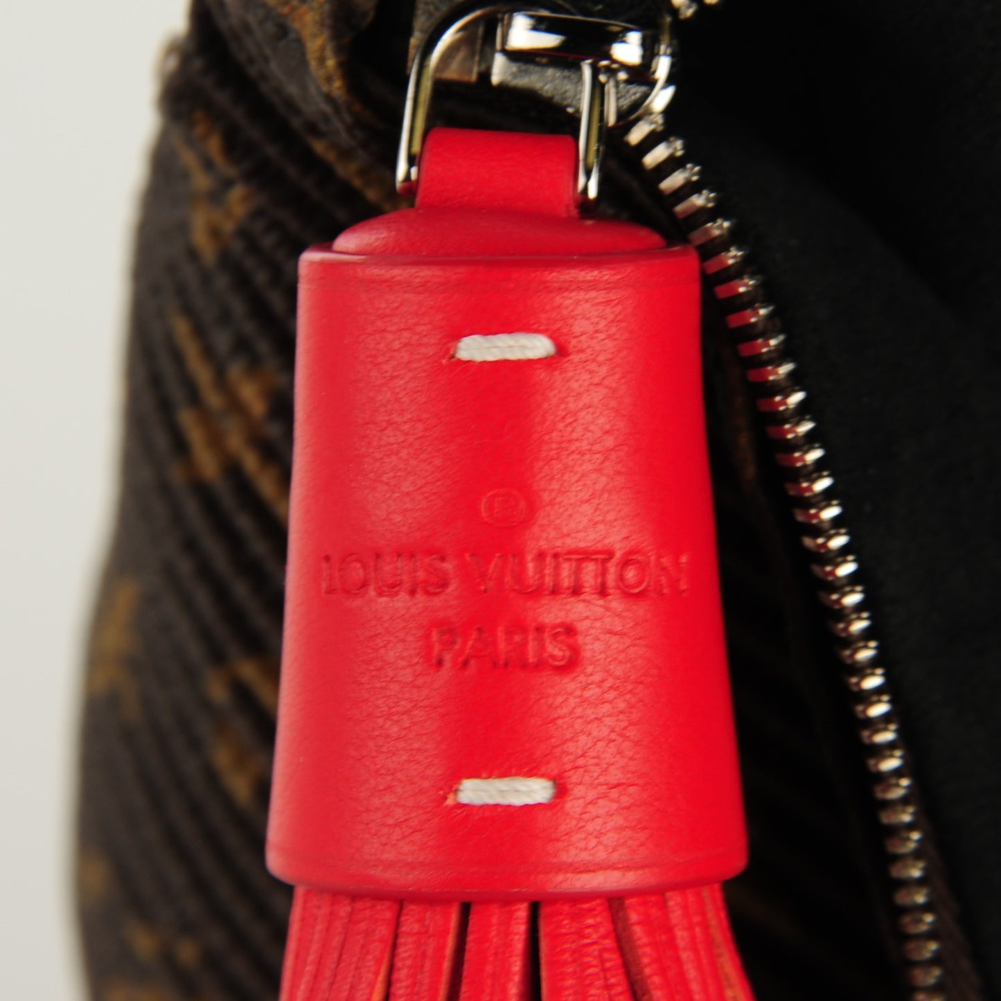Monogram Canvas Pleated Explorer Bag MM