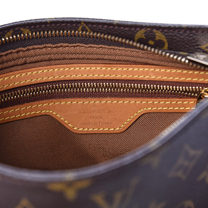 Louis Vuitton Monogram Trotteur 6 of 9