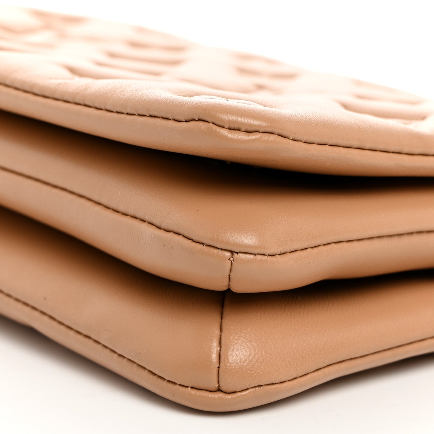 Lambskin Embossed Monogram Pochette Coussin Camel