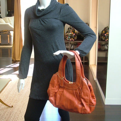 FASHIONPHILE COACHErgoLeatherPleatedFramedHoboCoral 2 of 10