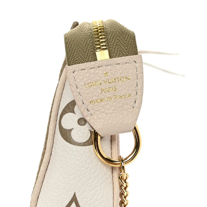 Louis Vuitton Empreinte Spring in the City Mini Pochette Accessories Kaki Beige Cream 6 of 7