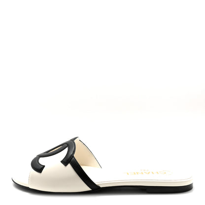 Chanel Lambskin CC Cutout Mules 37 Ivory Black 1 of 10