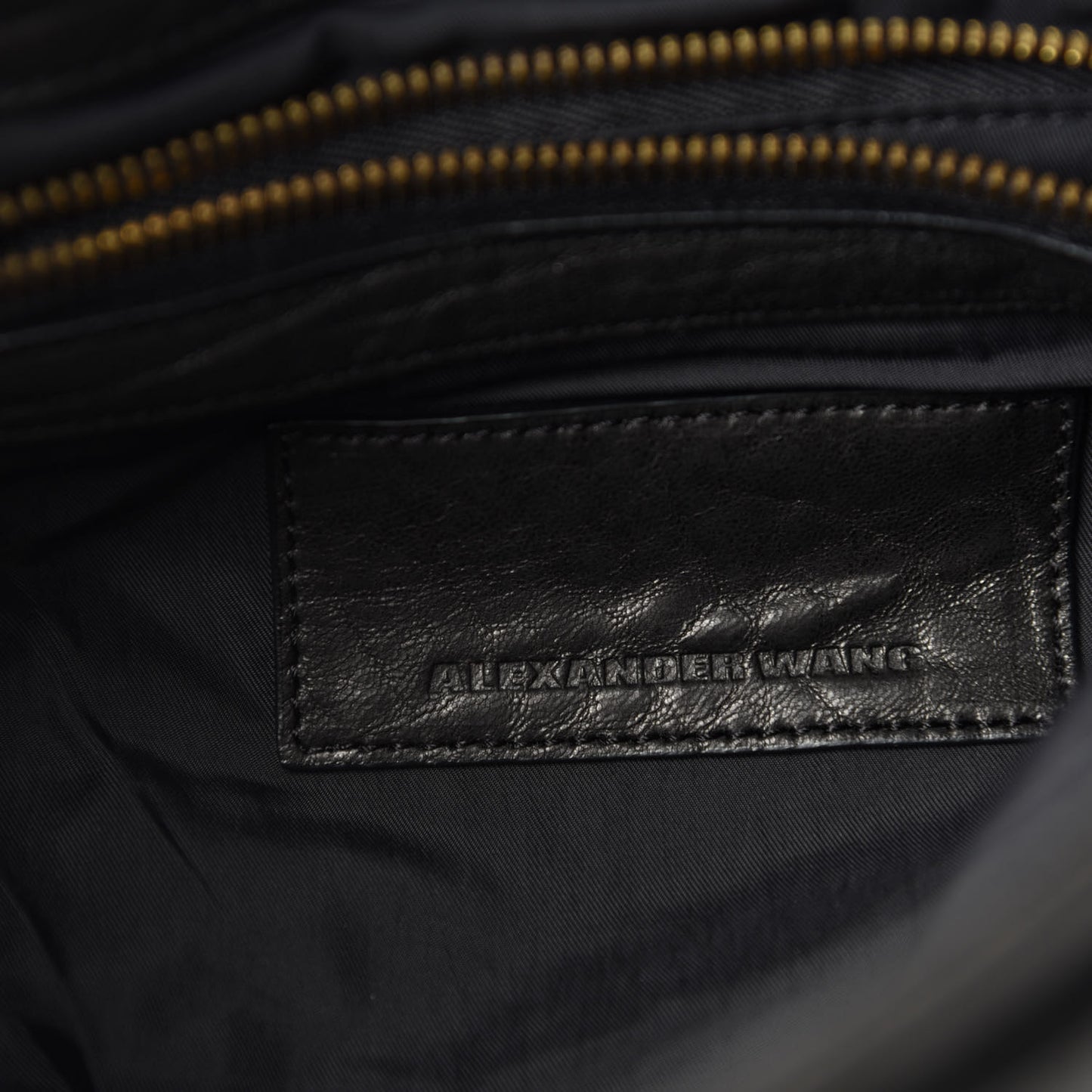 Pebbled Lambskin Lia Sling Black