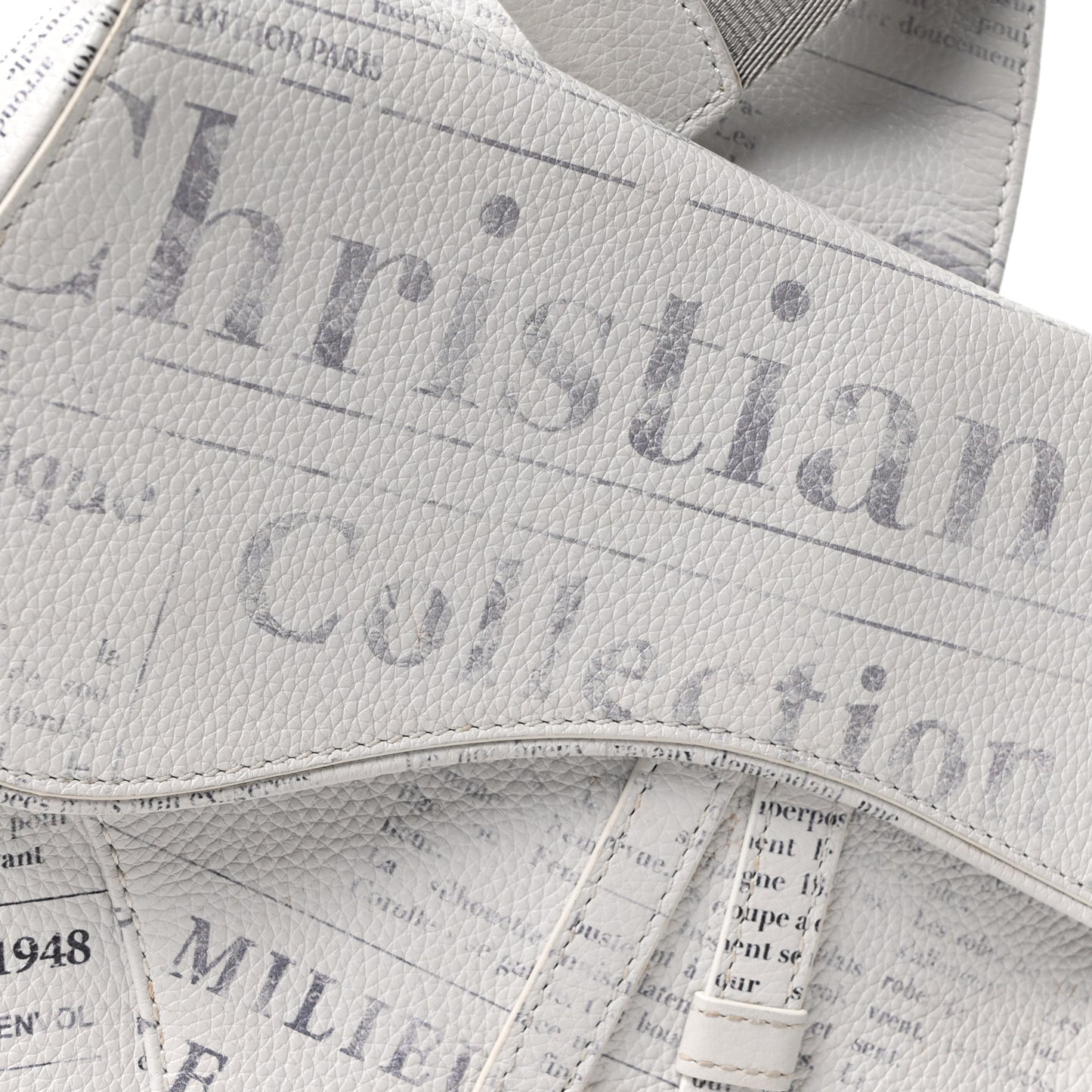 X DANIEL ARSHAM Grained Calfskin Newspaper Print Saddle Bag White