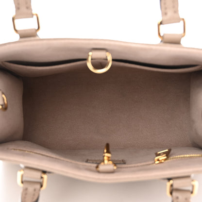 Louis Vuitton Empreinte Monogram Giant Onthego PM Tourterelle Creme 5 of 9