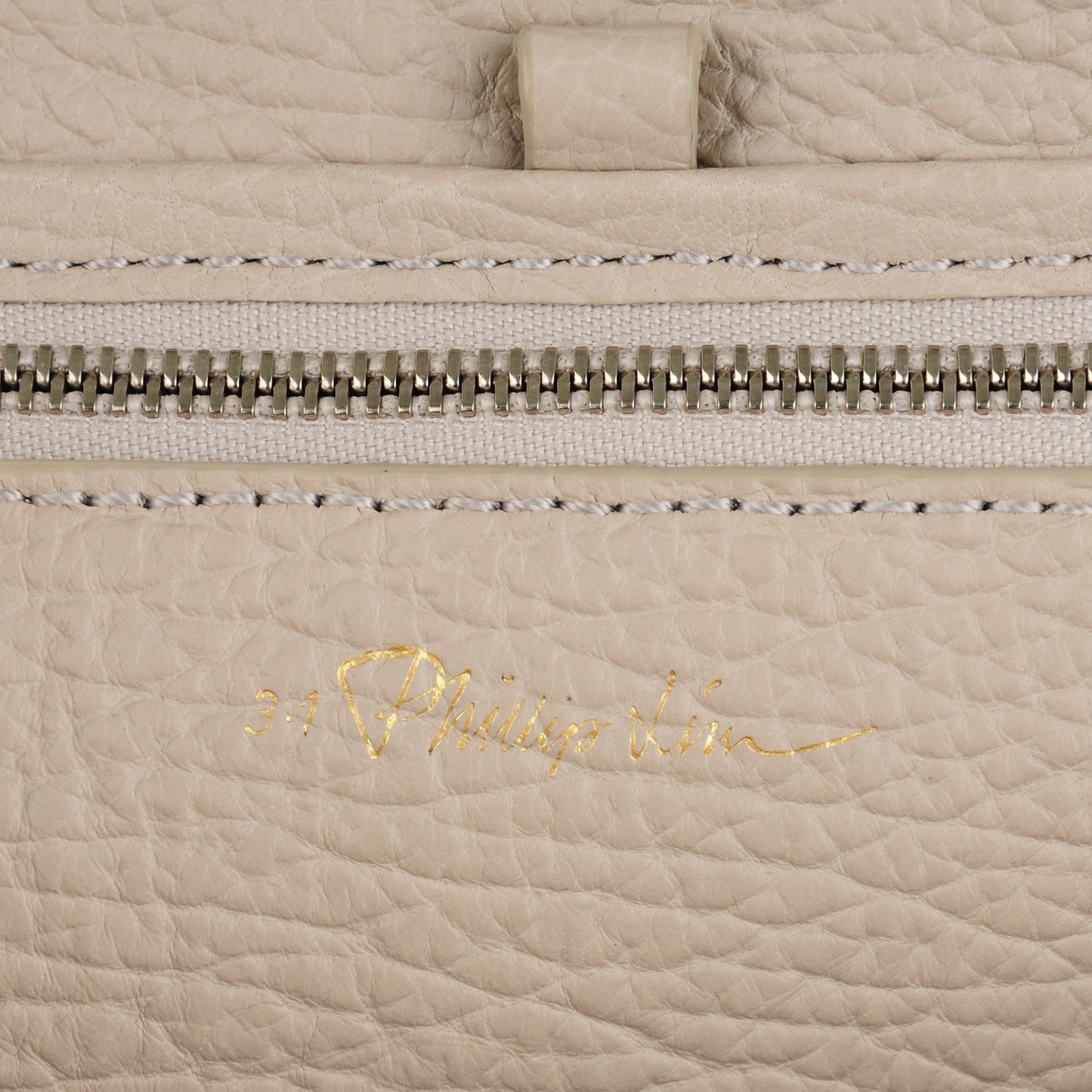 3.1 Textured Calfskin Pashli Backpack Feather