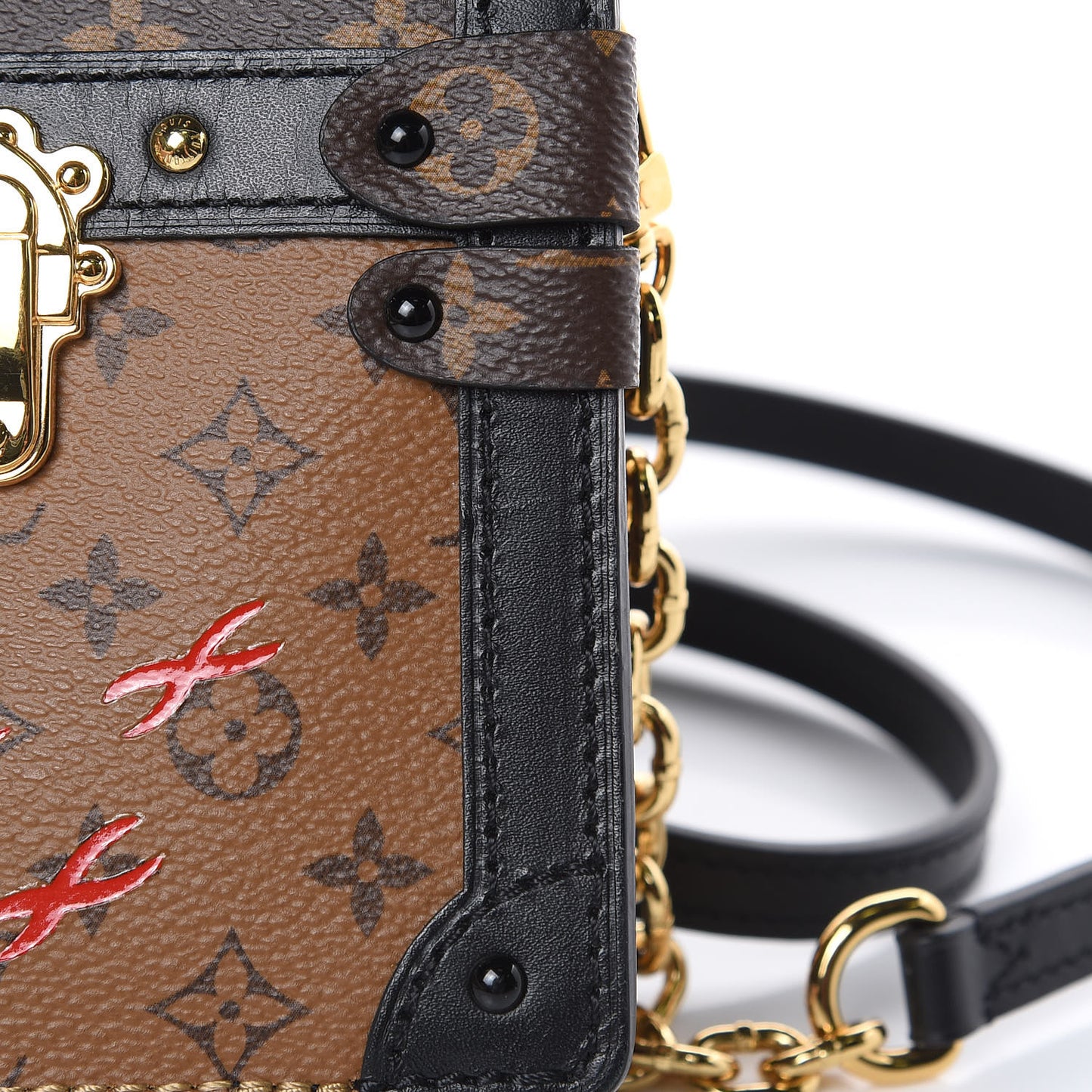 Reverse Monogram Trunk Clutch