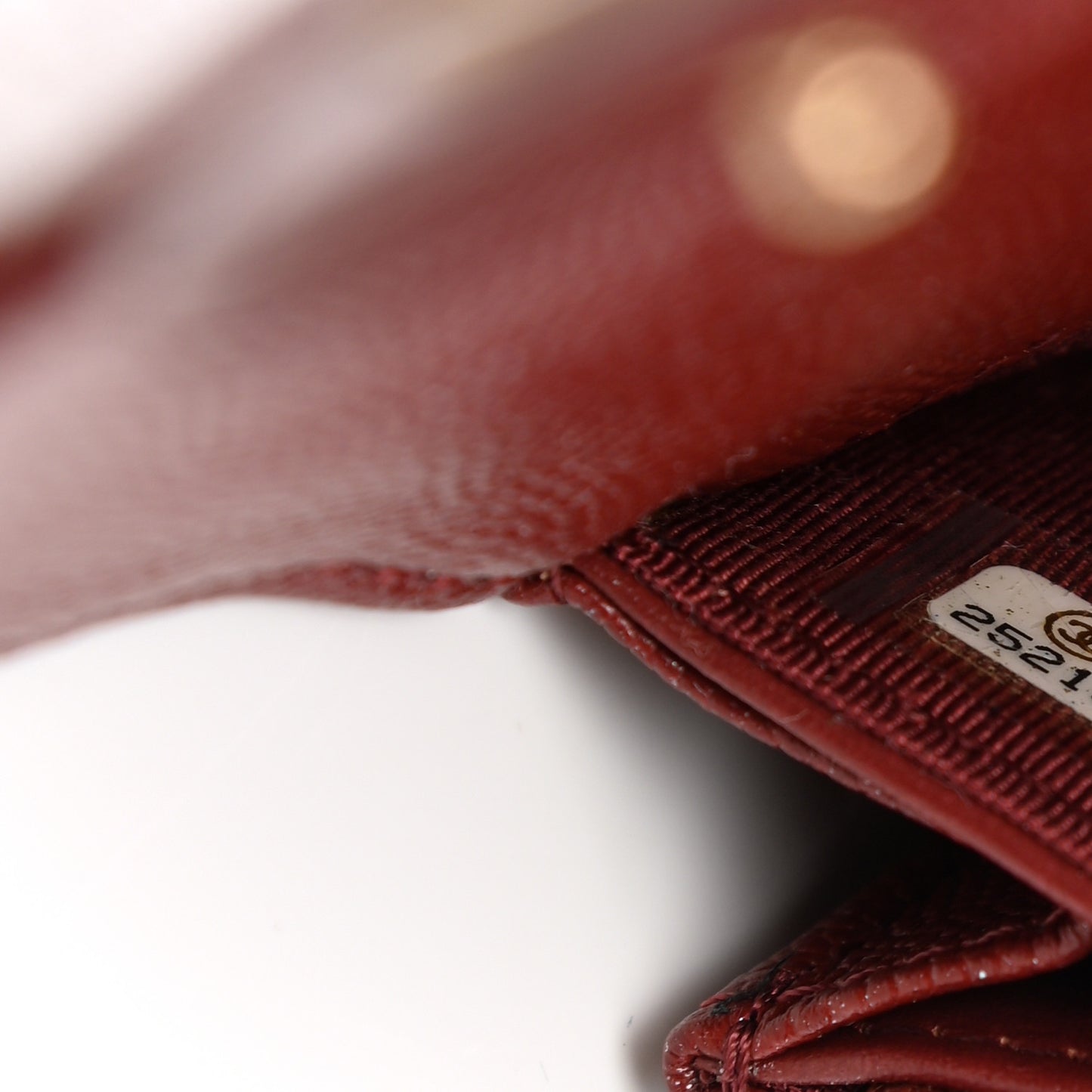 Iridescent Caviar Quilted Medium Flap Wallet Burgundy