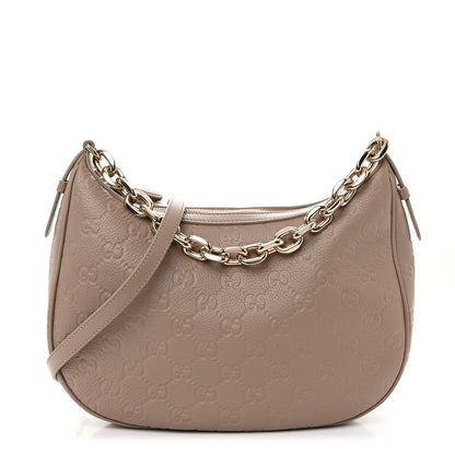Gucci GG Grainy Calfskin Emblem Large Half Moon Shoulder Bag Taupe 1 of 11