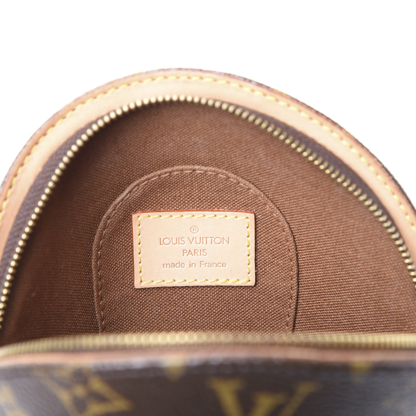 Monogram Mini Ellipse Wristlet Clutch