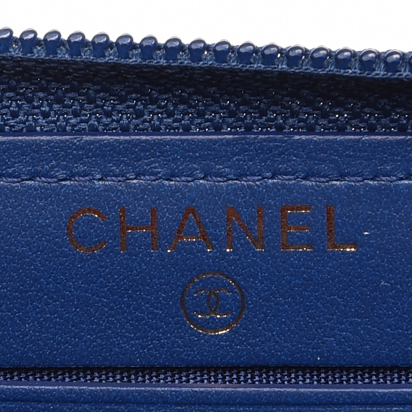 Caviar Quilted Small Boy Zip Around Wallet Dark Blue