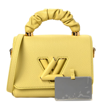 Louis Vuitton Taurillon Smooth Calfskin Scrunchie Twist One Handle PM Yellow 1 of 7