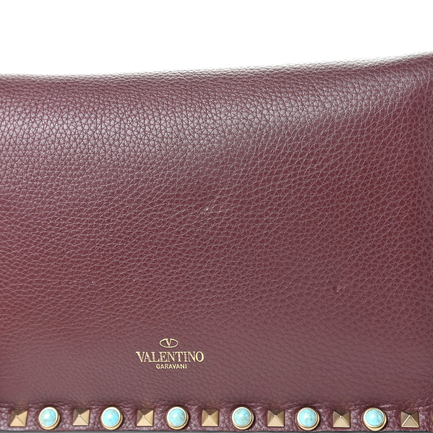Pebbled Calfskin Rockstud Rolling Wristlet Clutch Rubin
