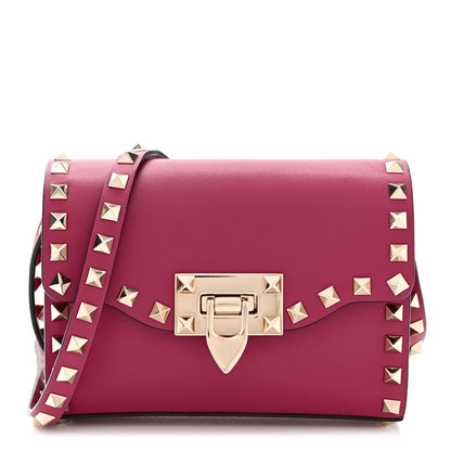 Valentino Garavani Vitello Mini Rockstud Flip Lock Crossbody Bag Deep Cyclamin 1 of 9