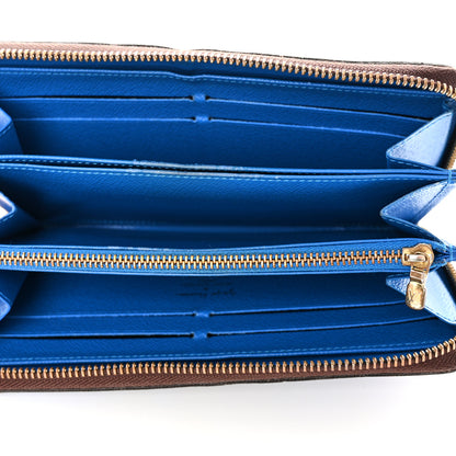 Louis Vuitton Monogram Kusama Pumpkin Dots Zippy Wallet Blue 5 of 9