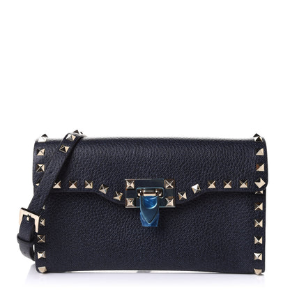 Valentino Garavani Pebbled Calfskin Medium Rockstud Flip Lock Crossbody Bag Deep Denim 1 of 8