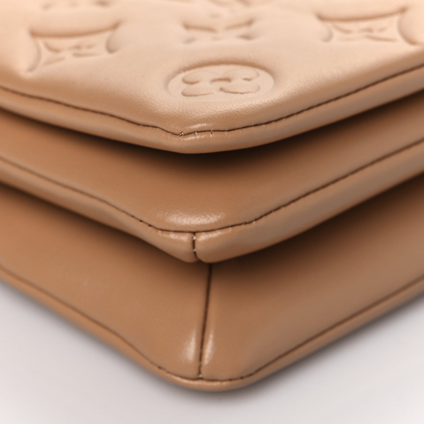 Lambskin Embossed Monogram Pochette Coussin Camel