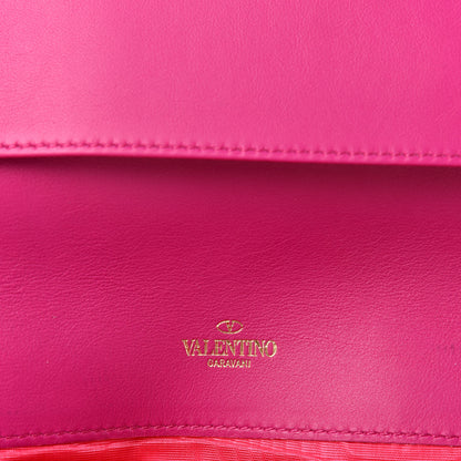 Valentino Garavani Nappa Rockstud Clutch Fuxia 7 of 9