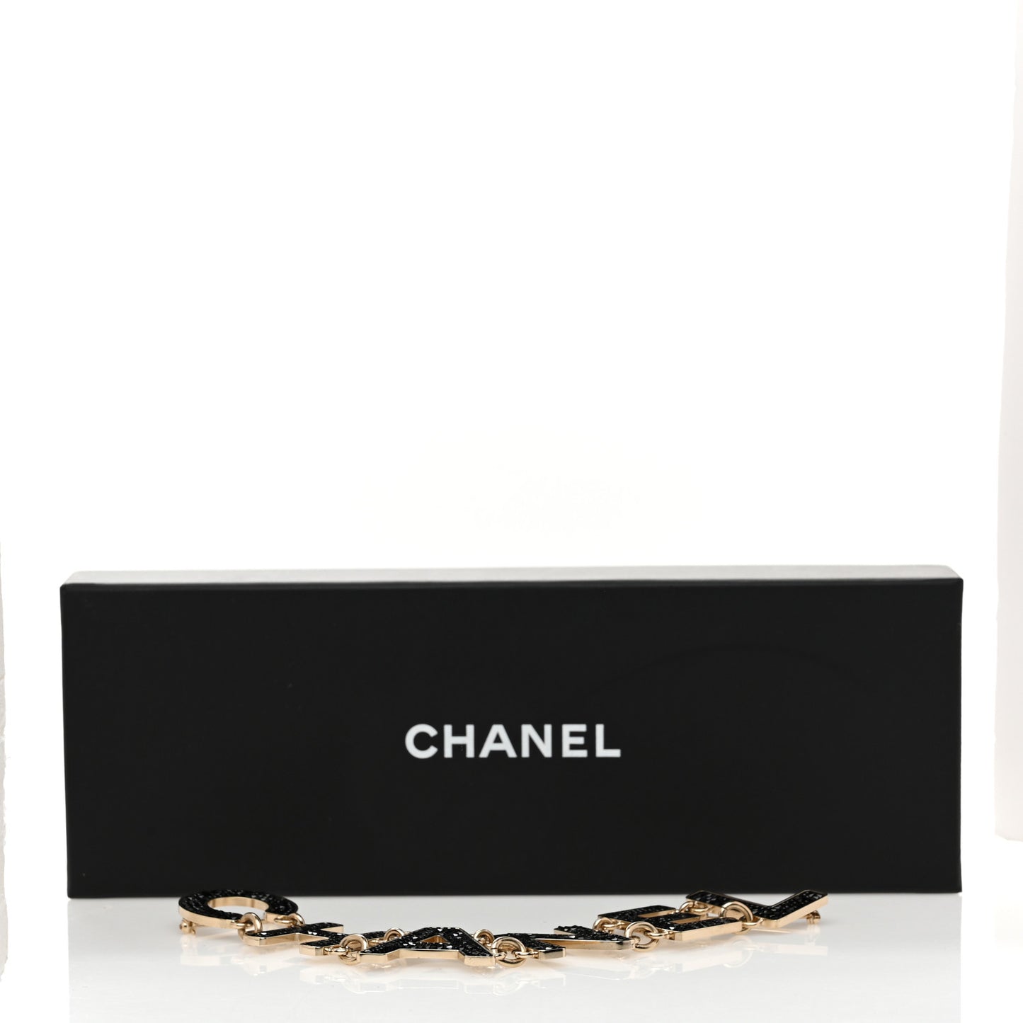 Crystal Cha-Nel Logo Brooch Black Gold