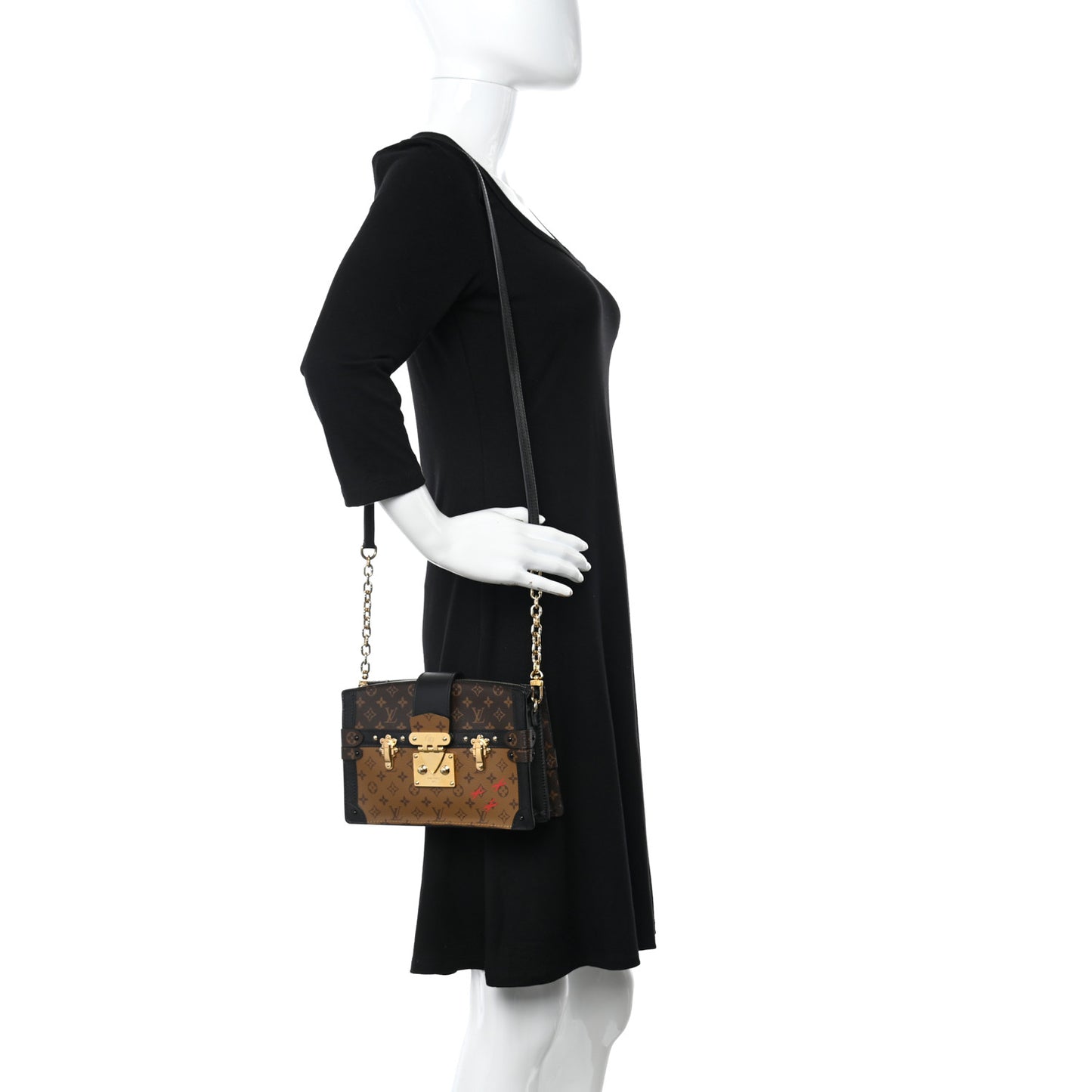 Reverse Monogram Trunk Clutch