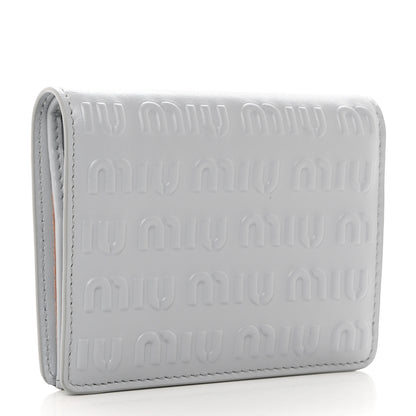 Miu Miu MIU MIU Calfskin Logo Embossed Bi-Fold Compact Wallet Fiordaliso 4 of 8