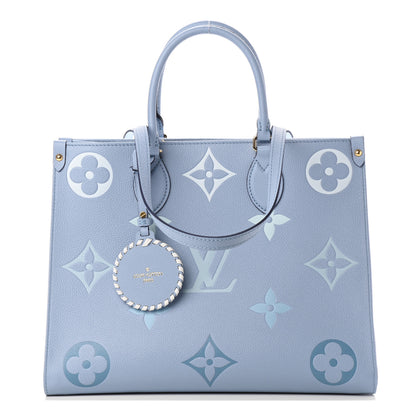 Louis Vuitton Empreinte Monogram Giant By The Pool Onthego MM Summer Blue 1 of 5