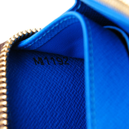 Louis Vuitton Monogram Kusama Pumpkin Dots Zippy Wallet Blue 7 of 9