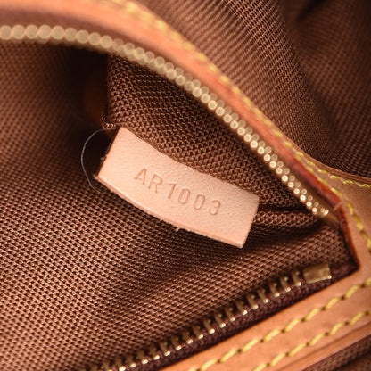 Louis Vuitton Monogram Trotteur 9 of 12