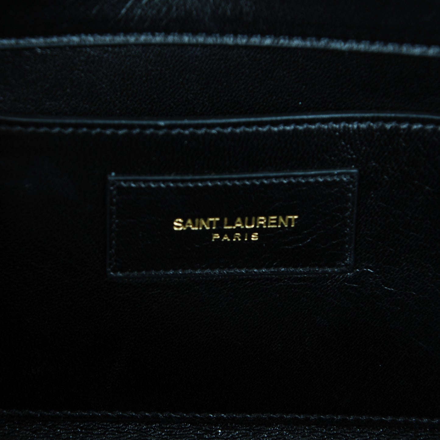 Suede Cassandre Tassel Clutch Black