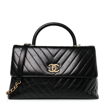 Chanel Aged Calfskin Chevron Quilted Large Coco Handle Flap Black 1 of 9