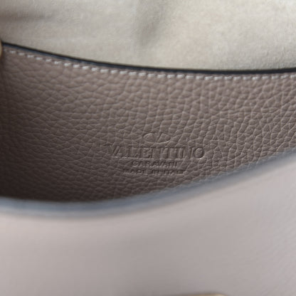 Valentino Garavani Pebbled Calfskin Medium Rockstud Flip Lock Crossbody Bag Poudre 7 of 8