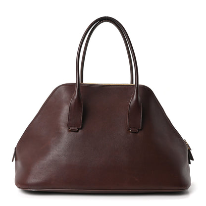 The Row Polished Saddle Calfskin Large Devon Bag Burgundy 1 of 9