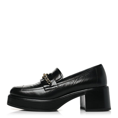 Chanel Shiny Calfskin Logo Loafers 37.5 Black 1 of 9