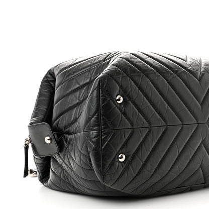Chanel Aged Calfskin Chevron Quilted Duffle Bag Black 9 of 10