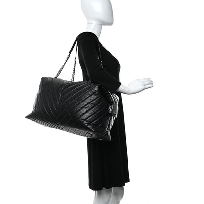 Chanel Aged Calfskin Chevron Quilted Duffle Bag Black 2 of 15