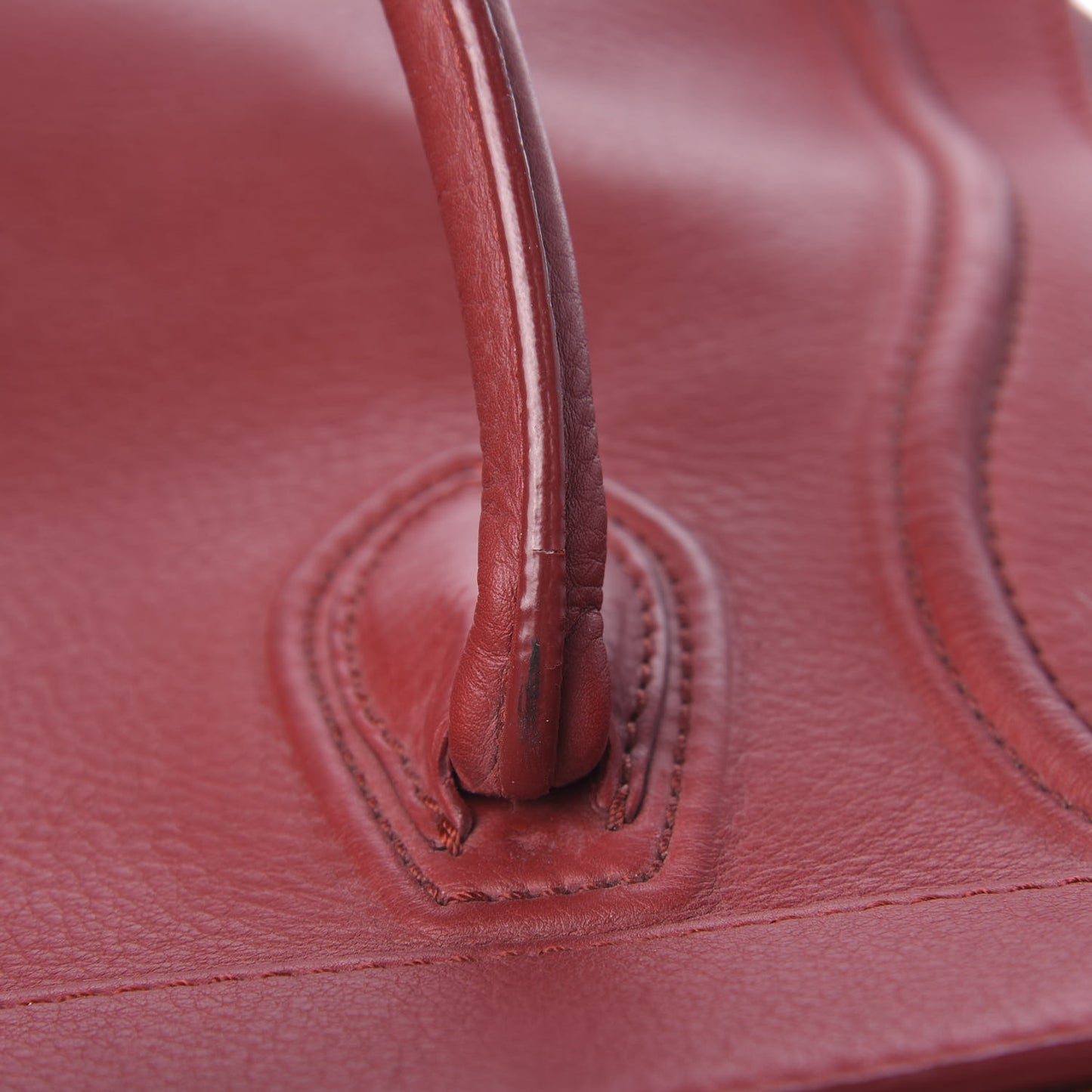 Supple Calfskin Medium Phantom Luggage Red